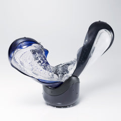 FLIP 360 opened flat on stand, revealing detailed textured inner surface with water droplets