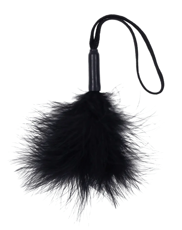 Close-up of the fluffy black feather pom on the Sensual Feather Tickler Teaser, showing texture detail