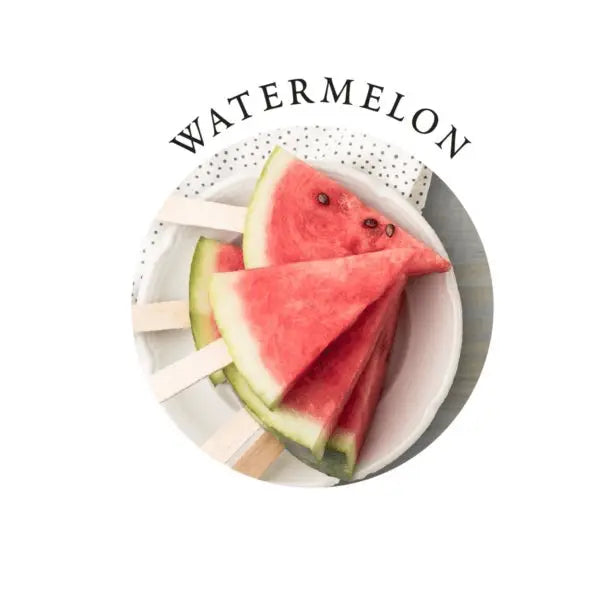 Fresh watermelon slices on popsicle sticks reflecting the gift set's natural watermelon scent