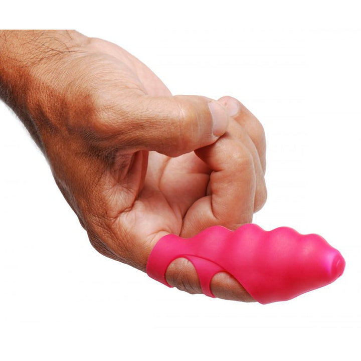 Frisky Ripples finger vibrator in pink silicone worn on fingertip, front view