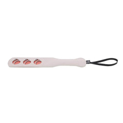 Front angle of peach-motif spanking paddle showing cutout imprint pattern and slim paddle profile