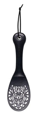 Front view of black Lace Spanker displaying intricate floral cut-out pattern on paddle face