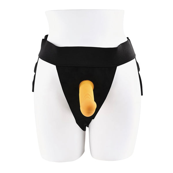 Front view of black strap-on harness with yellow silicone vibrating dildo on mannequin