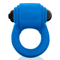 Front view of the blue REVRING cock ring with embedded bullet vibe inserted