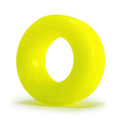 Front-facing view of acid yellow COCK-T cockring highlighting its round toroidal silicone form