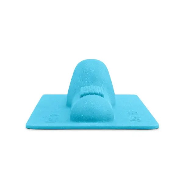 Front-facing view of The Cowgirl Magic Hide showing dual-mound silicone design on flat base