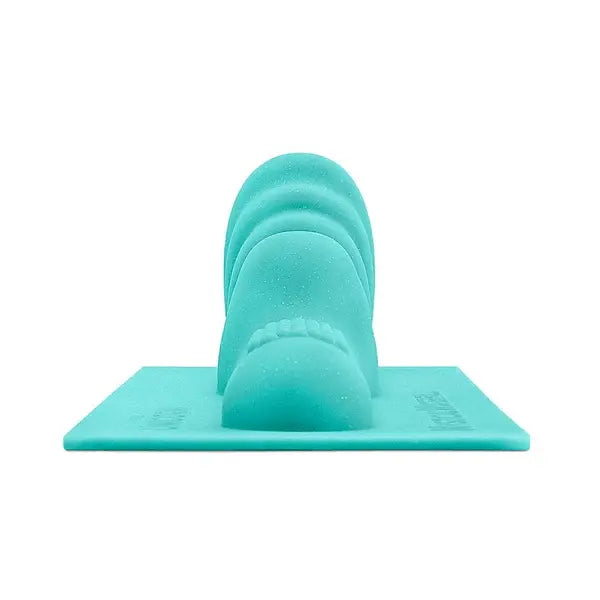 Front-facing view of Mystical Waterfall highlighting layered wave-shaped ridges in teal silicone