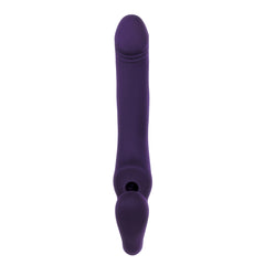Front-facing view of purple strapless strap-on showing textured insertable shaft and lower anchor end