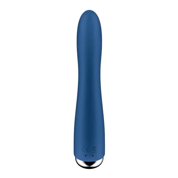 Front-facing view of Spinning Vibe 1 displaying CE certification marks and magnetic charge port