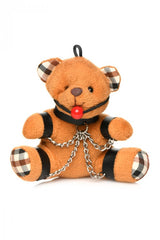 Front view of gagged teddy bear keychain with red ball gag, collar ring, and silver chain accents