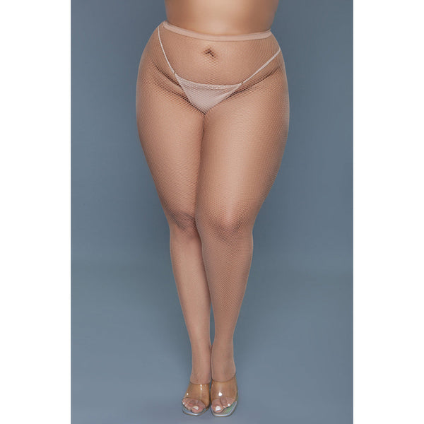 Front view of nude queen fishnet pantyhose with elastic waistband and sheer coverage on plus-size model