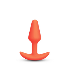 Front view of orange beginner silicone anal plug with tapered tip and flared base