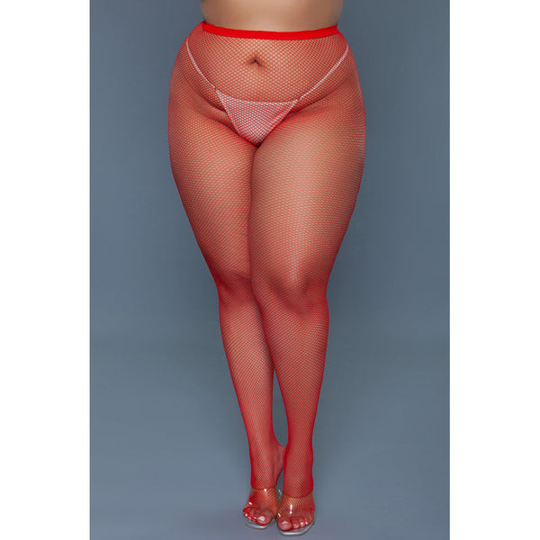Front view of red fishnet pantyhose with built-in thong panel, worn with clear heels