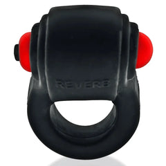 Front-on view of REVRING displaying the red vibe capsule seated in the silicone housing