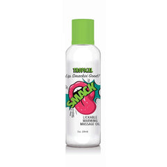 Front view of Smack Tropical warming massage oil 2 oz bottle with pop-art lip graphic