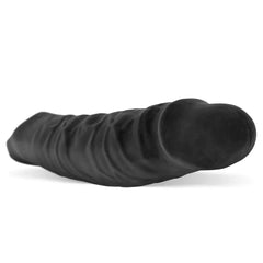 Front tip close-up of black Snake sheath showing ridged shaft and rounded head