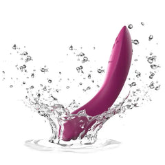 Fuchsia Rave 2 vibrator splashing in water, highlighting its waterproof design