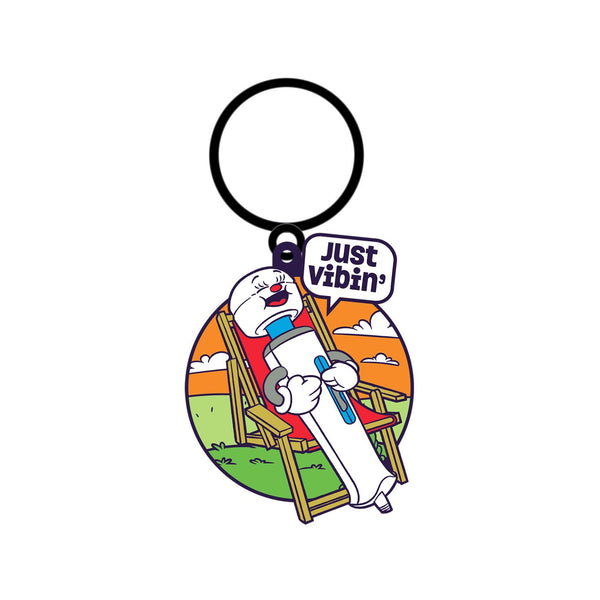 Fuck Buddies Just Vibin' rubber keychain featuring a cartoon character relaxing in a deck chair
