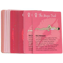 Full deck of pink and red cards fanned out displaying technique instructions