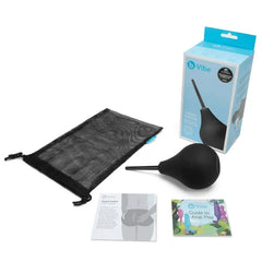 Full kit displayed beside retail box: enema bulb, mesh drying bag, and printed guides