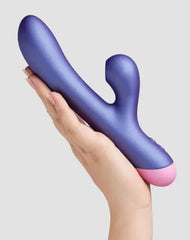 Full side view of blue-purple rabbit vibrator held in palm, showing overall length and shape