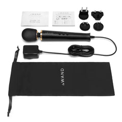 Full unboxing contents: massager, cord, adapters, storage bag, and guides