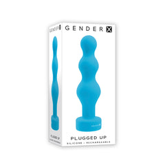 Gender X Plugged Up silicone rechargeable anal plug displayed beside its retail packaging