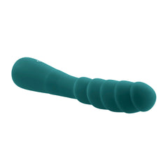 Gender X Scorpion laying flat, highlighting segmented ridges along curved shaft