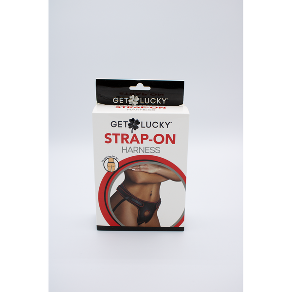 Get Lucky Strap-On Harness retail box, front view, white packaging with red accent circle