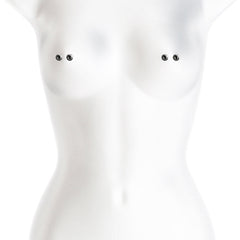 Gunmetal magnetic nipple clamps shown applied symmetrically on a white mannequin torso