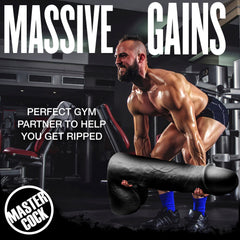 Gym lifestyle image showing Moby 2 Foot Super Dildo used playfully as an oversized barbell prop