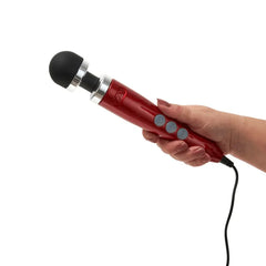 Hand gripping the Doxy Die Cast 3 Wand showing ergonomic handle size and corded power design