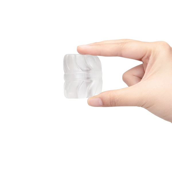 Hand gripping the Stretch-Tech Barrel sideways to illustrate its small size