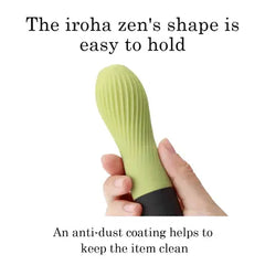 Hand gripping zen MATCHA vibrator showing ergonomic shape and anti-dust soft-touch silicone coating