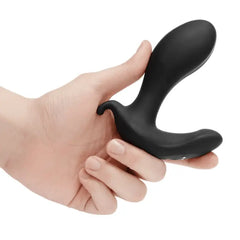 Hand holding b-Vibe Expand Plug to demonstrate compact size and ergonomic shape