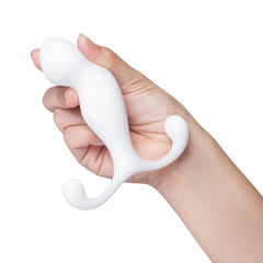 Hand holding b-Vibe P-Spot Pro Plus to show soft flexible silicone and overall grip size