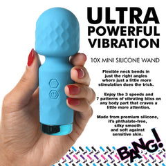 Hand holding Bang! 10X Mini Wand highlighting flexible neck and premium phthalate-free silicone build