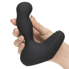 Hand holding black silicone prostate massager attachment showing curved internal arm