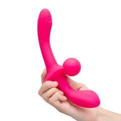 Hand holding Double Tap upright showing scale and curved insertable end with ridged tip