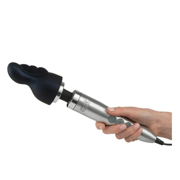 Hand holding Doxy Die Cast 3 wand with Nexus clitoral attachment fitted on head