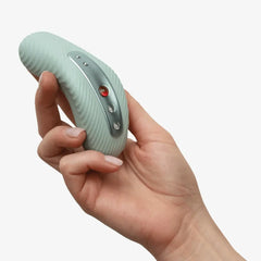 Hand holding Fun Factory Laya III upright demonstrating compact palm-friendly size