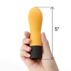 Hand holding the Iroha Zen vibrator showing its compact 5-inch total length for easy grip