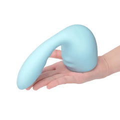 Hand holding Le Wand Flexi blue silicone attachment to show flexible curved shape and size
