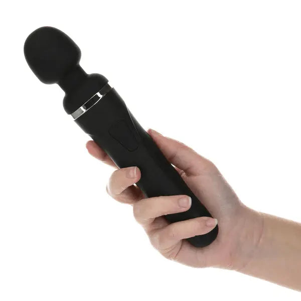Hand holding Lovense Domi 2 black wand vibrator to demonstrate comfortable grip and size