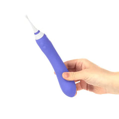 Hand holding Lovense Hyphy purple dual-ended vibrator to show ergonomic size and grip