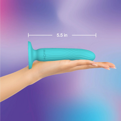 Hand holding the plusOne Dil-Lite showing 5.5 inch length against a purple and blue background