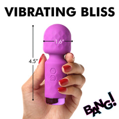 Hand holding purple mini wand with dimensions shown: 4.5 inches tall, 1.6 inches wide head