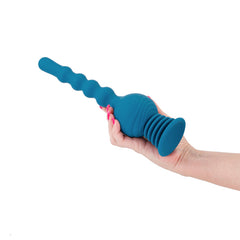 Hand holding the Revolution Hurricane teal silicone beaded anal vibrator showing full size