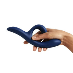 Hand holding the We-Vibe Nova 2, demonstrating its flexible, body-safe silicone build