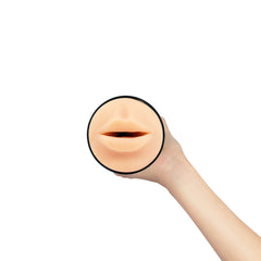 Hand presenting Feel Stroker mouth masturbator from above, highlighting realistic lip detail